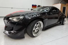 Glossy Black and Red Coupe Wrap in San Antonio by MC Wraps